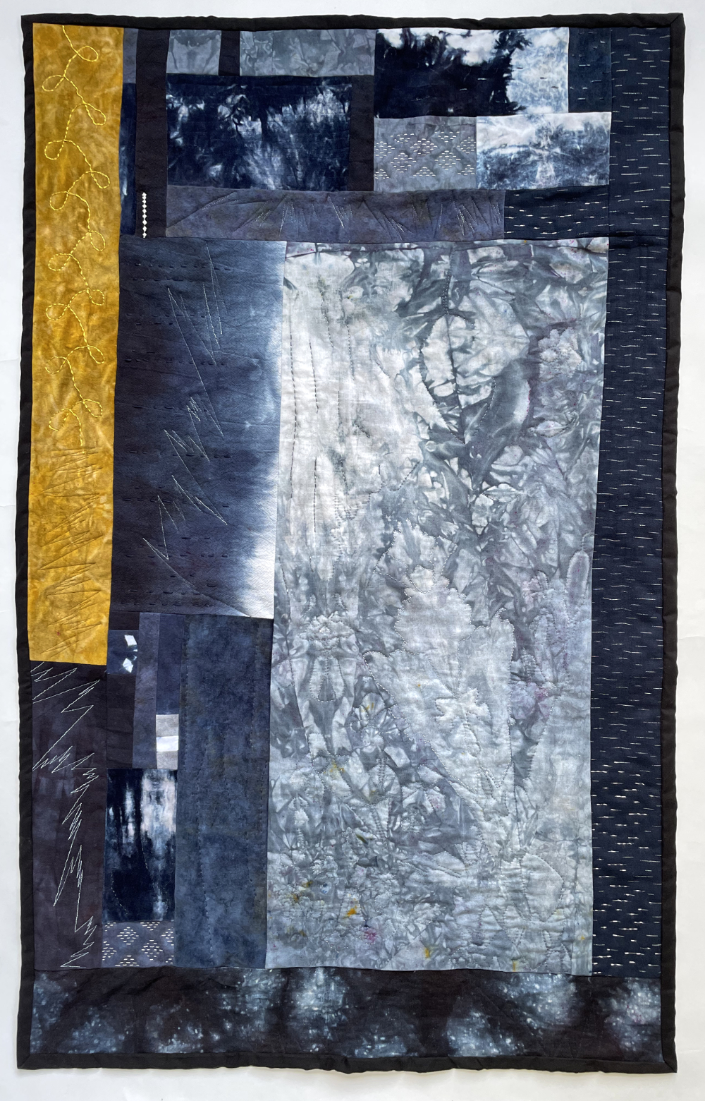 abstract rectangles in shades of dark blue with bursts of light and contrasting gold stripe on the left