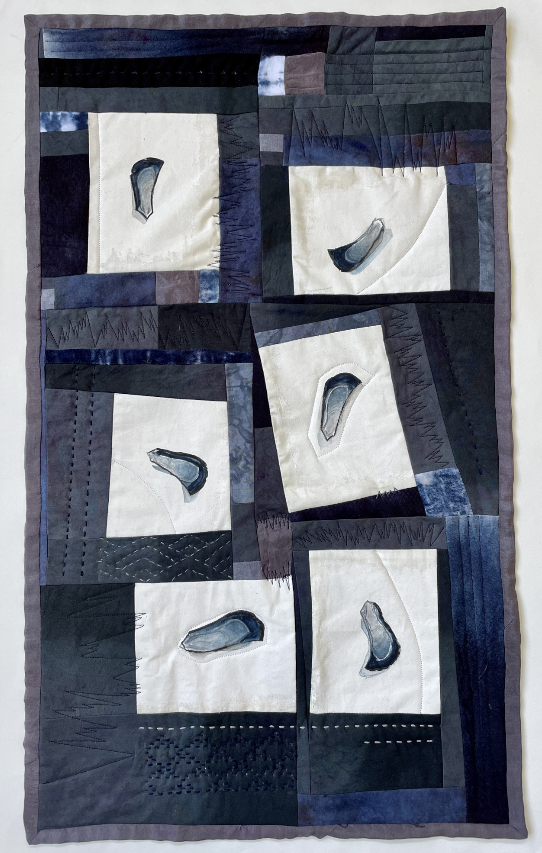 collagelike quilt with six panels each painted with the same mussel shell fragment in different positions