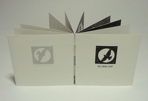 softcover book with linocuts of bird constellations