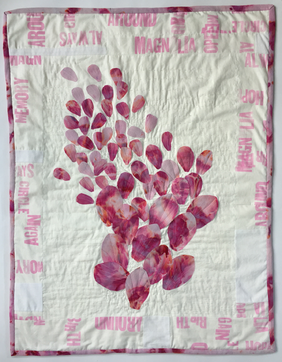 appliqueed quilt of magnolia petals falling
